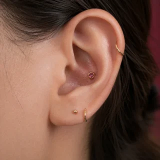 Conch, a conch piercing in the inner shell of the ear with a small stud or ring