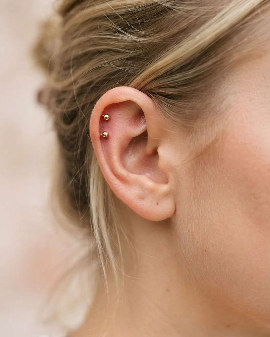 Close-up illustrating what a double ear piercing actually is