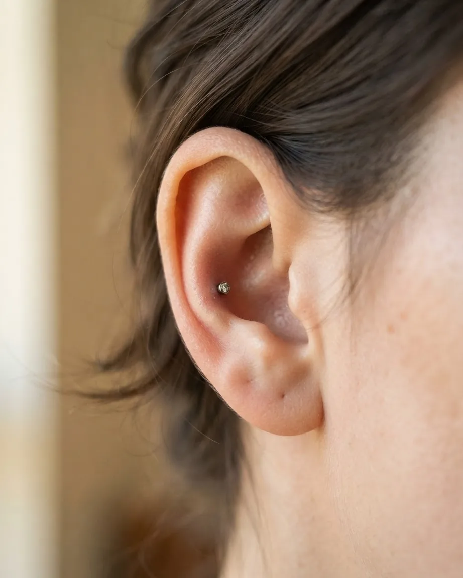 Detail view of how a flat piercing is actually done