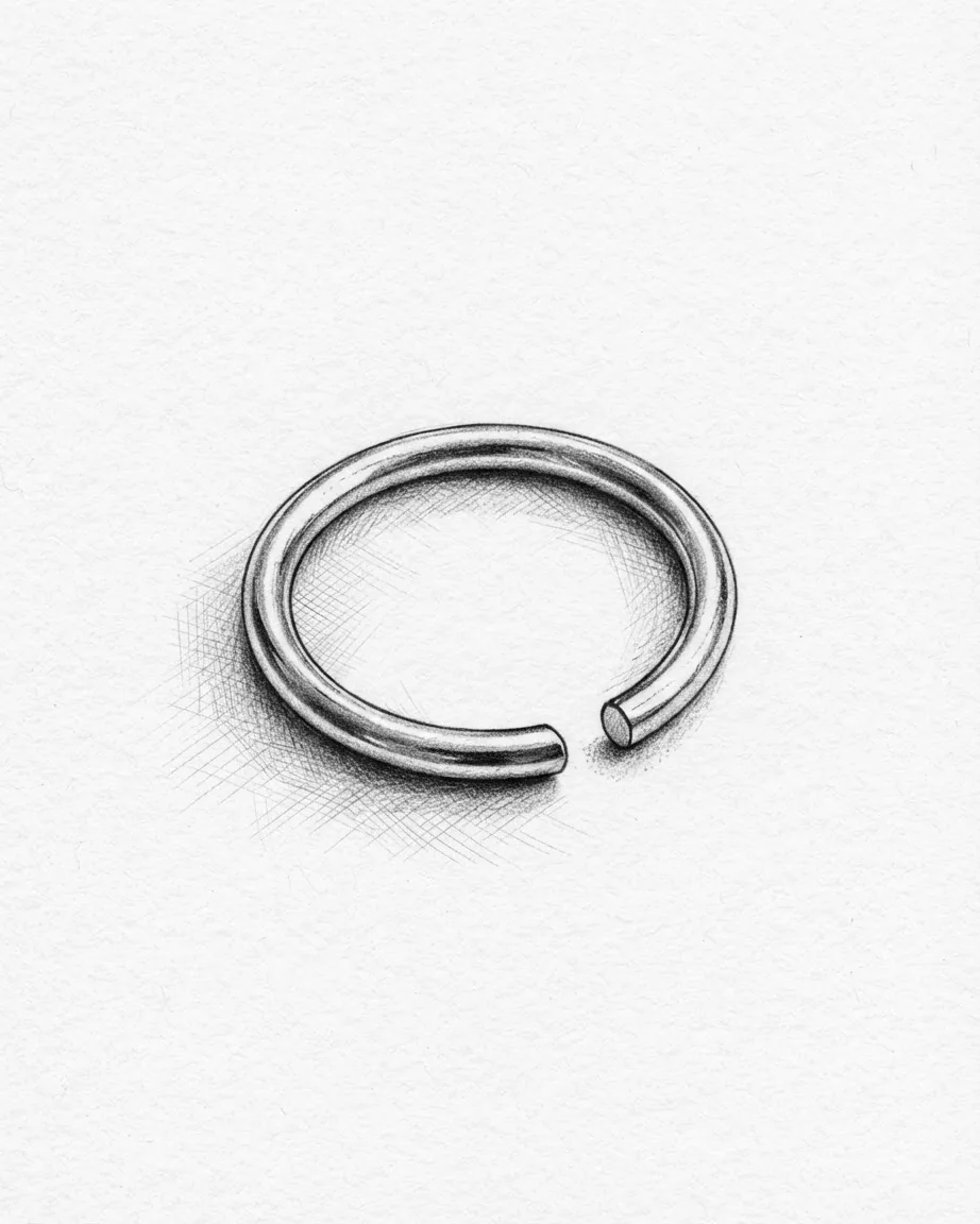 A pencil sketch of a single open-ended metal jewelry ring resting on a plain white textured surface.